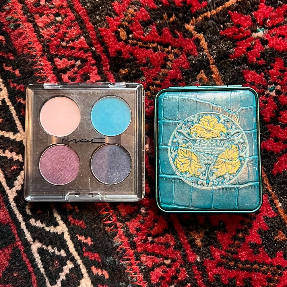 2 Mac eyeshadow palettes.